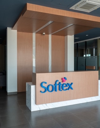 office fitting out custom furniture workstation aetrio timber series chair and soft seating at Softex Indonesia Plant Office